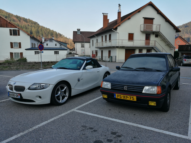 Monday morning. My 1987 Peugeot 205 CTi convertible on the right. What you see on the bonnet is ice, not peeling clearcoat.